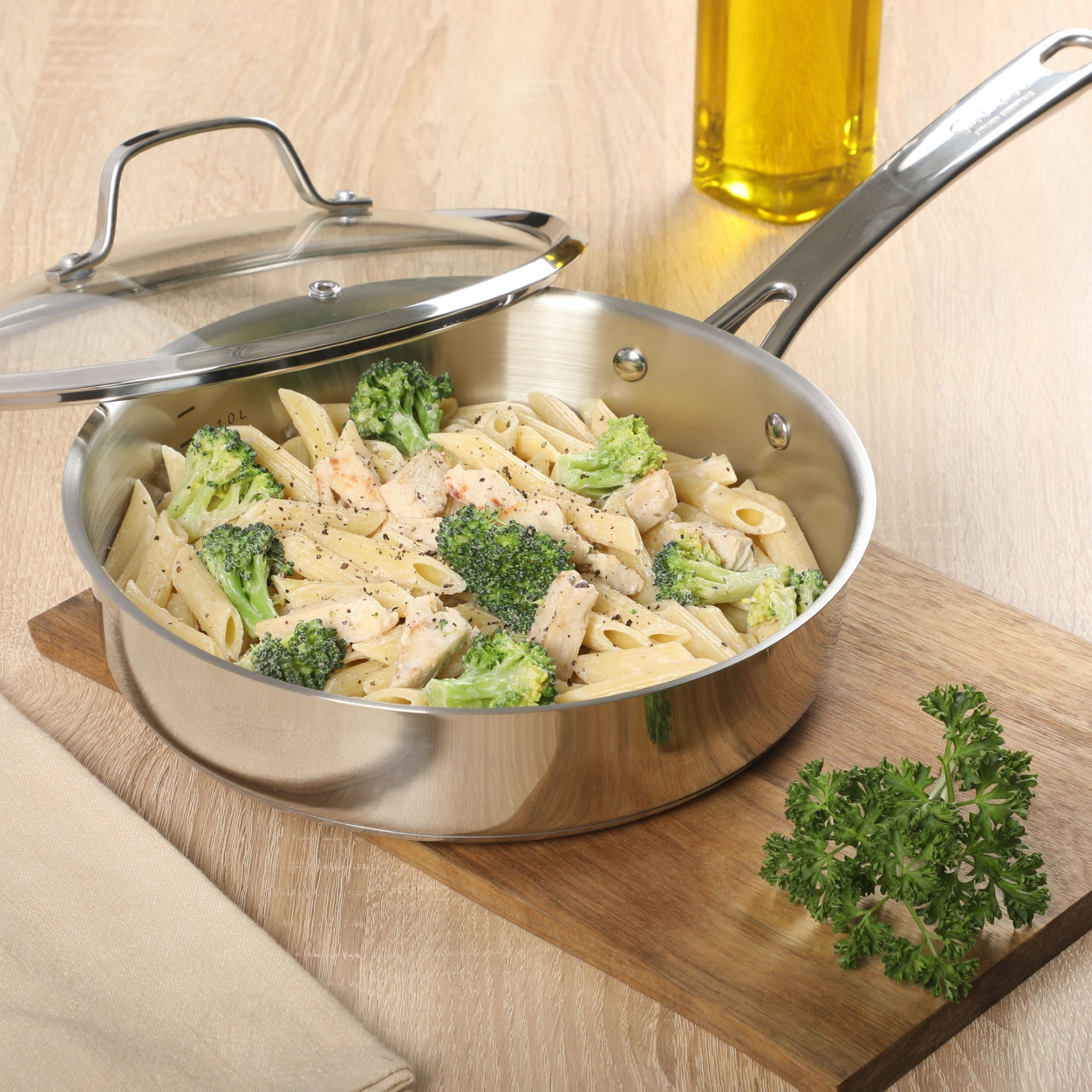 Sur La Table Kitchen Essentials 10 Piece Stainless Steel Non Toxic Pots and Pans Kitchen Cookware Set W/ Triply Encapsulated Base - Induction Safe - Image 6