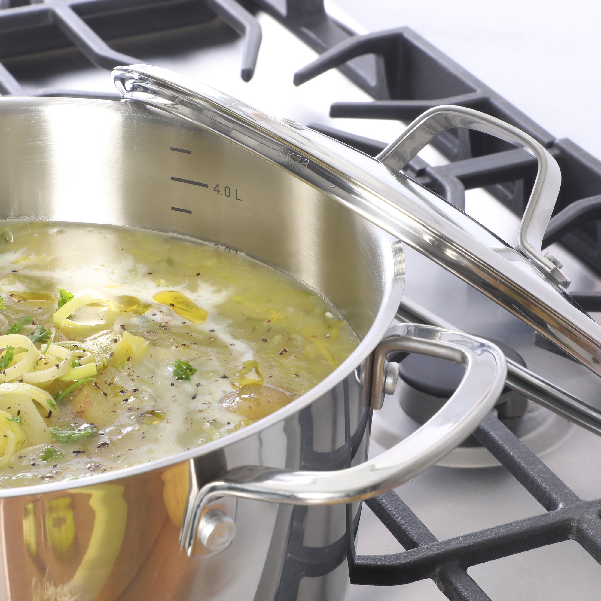 Sur La Table Kitchen Essentials Chef's Deck 3-Piece 5.3-Quart Stainless Steel Dutch Oven with Steamer Insert & Glass Lid – Induction Ready, Tri-Ply Base, Polished Finish & Hollow Stay-Cool Handles - Image 8
